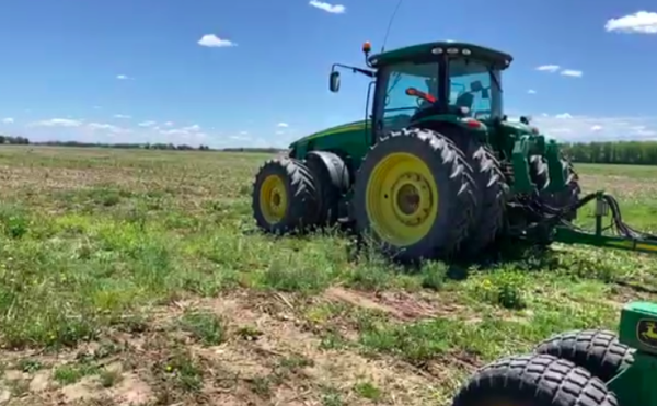 Andy Stickel welcomes students to his family farm